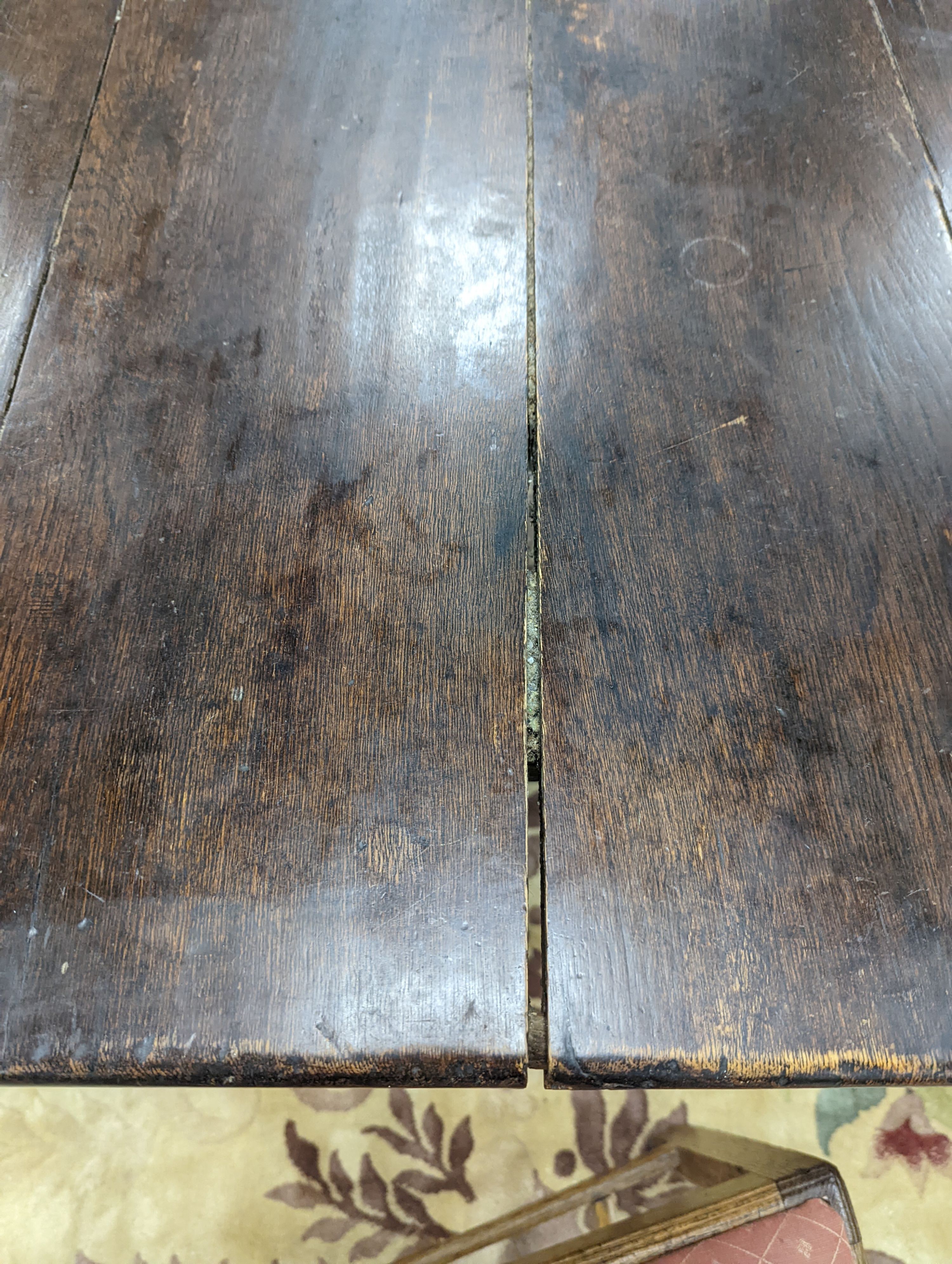 A 17th century style rectangular oak refectory dining table. Length -183cm, Width-91cm, Height-74cm.
